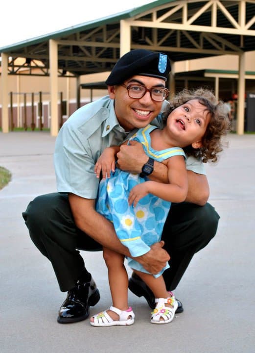 Derek Davis in Army uniform with his daughter Grace
