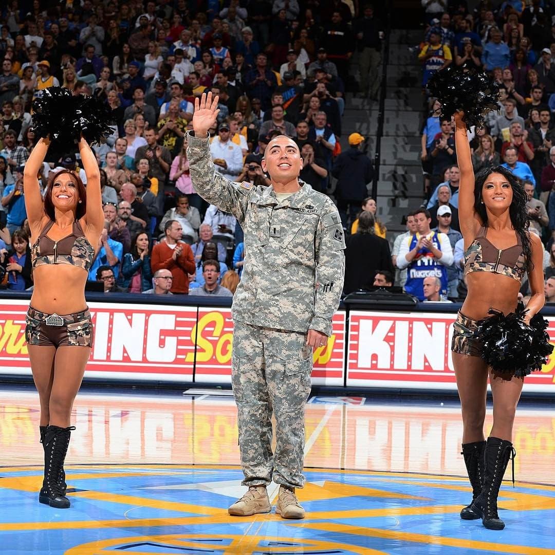 Derek Davis honored as Hero of the Game during his military service